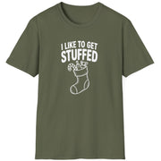 Funny Christmas Humor Short Sleeve Shirt with a stocking stuffed with presents and the text "I Like to get Stuffed" - Military Green