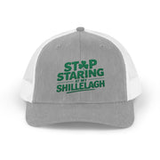 a gray and white curved trucker hat with the phrase "Stop Staring at my Shillelagh" funny St Patricks Day pub crawl or parade design