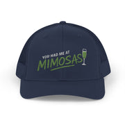 a navy curved bill trucker hat with the phrase'You Had Me at Mimosas' text funny Spring break, girls trip, guys trip, beach trip, summer vacation, lake season design