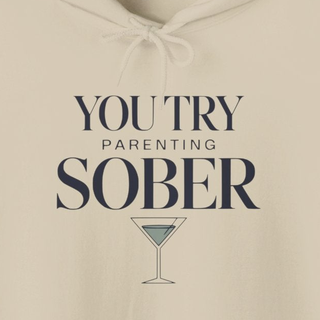 a beige hoodie with text 'You try parenting sober' funny mothers day, girls trip, mom life design