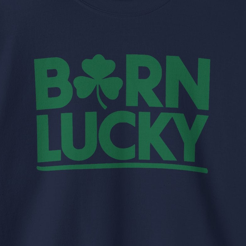 navy blue sweatshirt with 'Born Lucky' text and green clover funny st patricks design