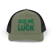 a green and black curved bill trucker hat with 'Rub Me for Luck' text funny st patricks day pub crawl design