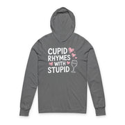 gray hoodie with the phrase “Cupid Rhymes With Stupid” with an ink sketched wine glass and sketched valentine hearts to  complete the design