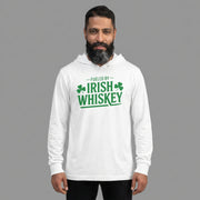 Man wearing a white hoodie with 'Fueled by Irish Whiskey' text and shamrock design on a gray background