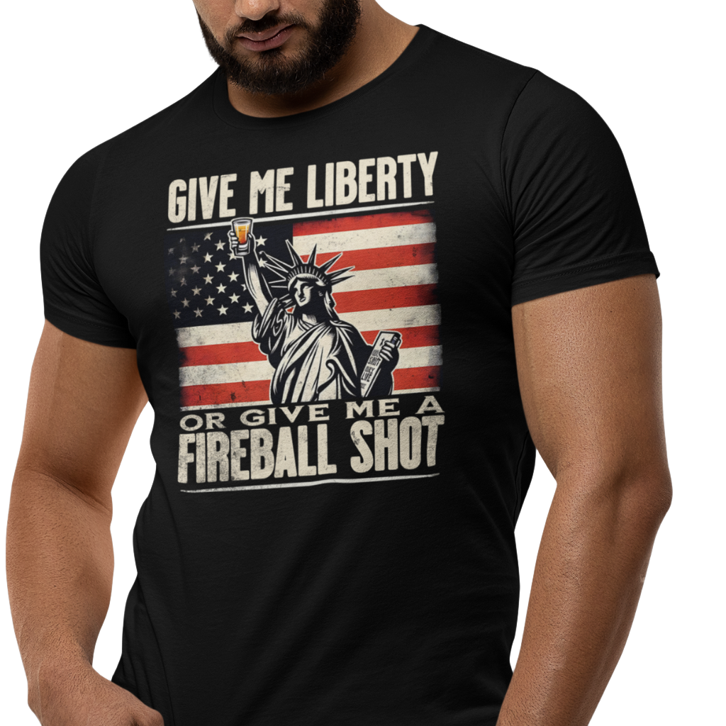 T-shirt with 'Give Me Liberty or Give Me a Fireball Shot' text, Statue of Liberty holding a shot glass, and distressed American flag background.