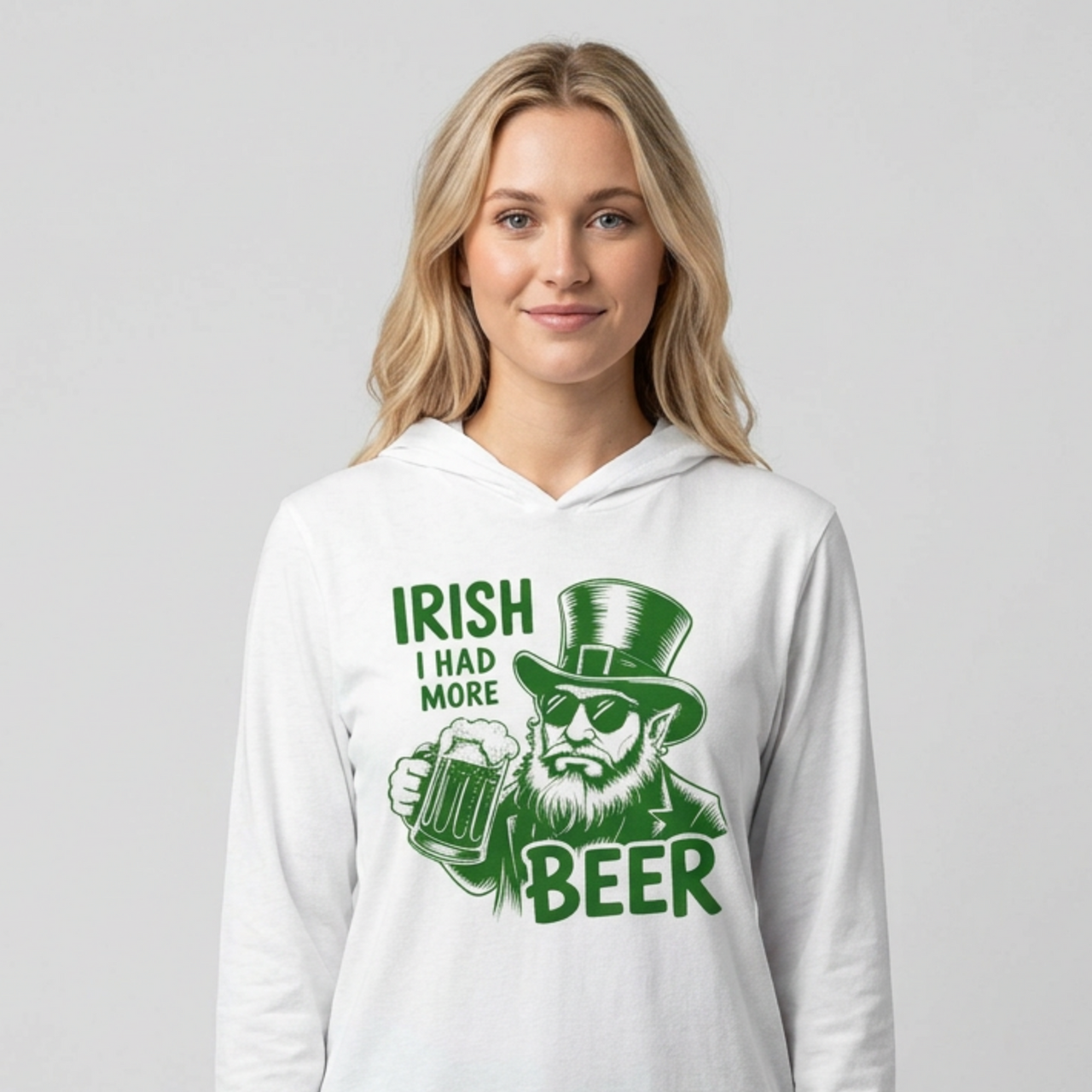 Woman wearing a white lightweight hoodie with a leprechaun graphic and the phrase irish I had More Beer funny St Patricks Day pub crawl and Parade design