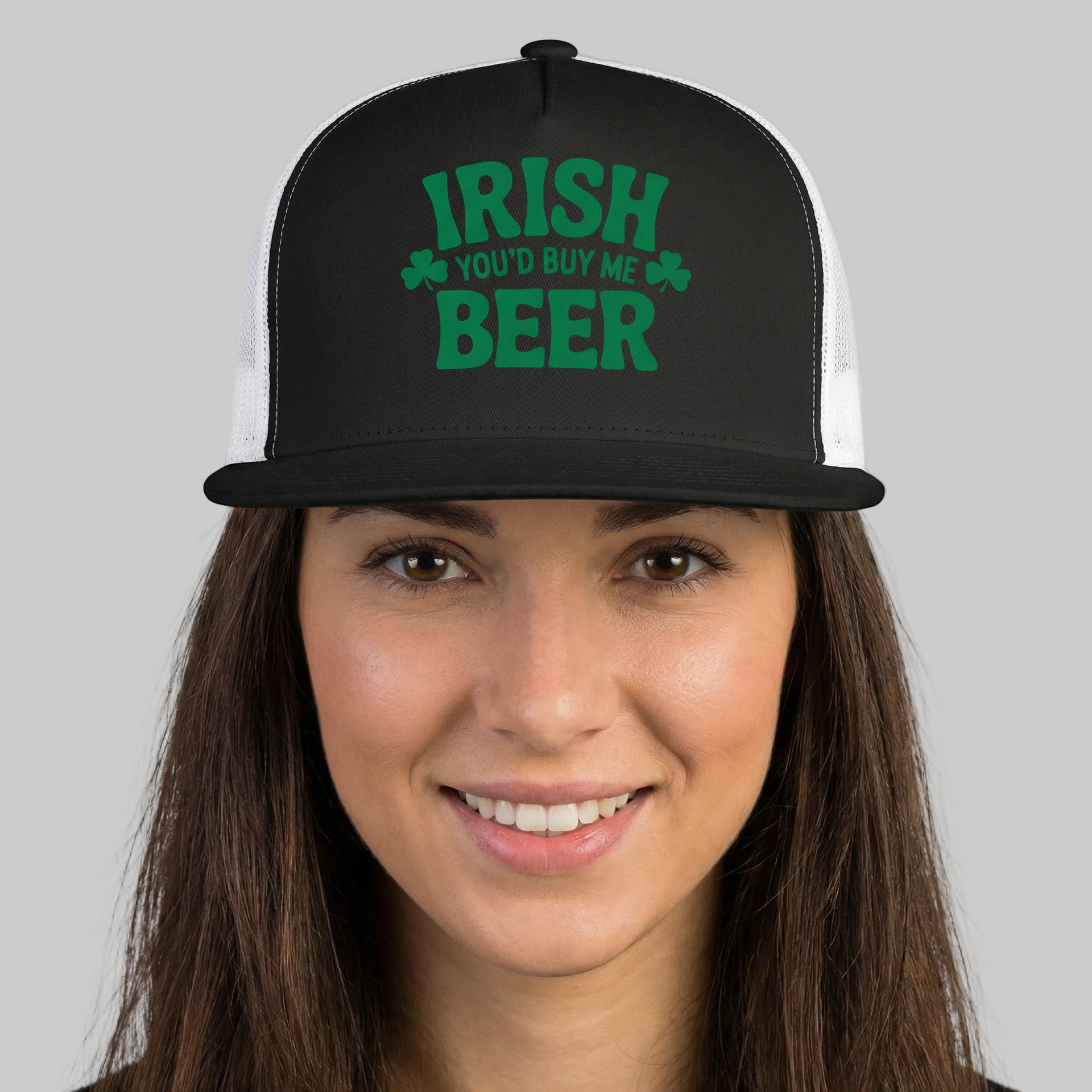 Person wearing black and white flat bill trucker cap with  text 'Irish you'd buy me beer' funny st patricks day design