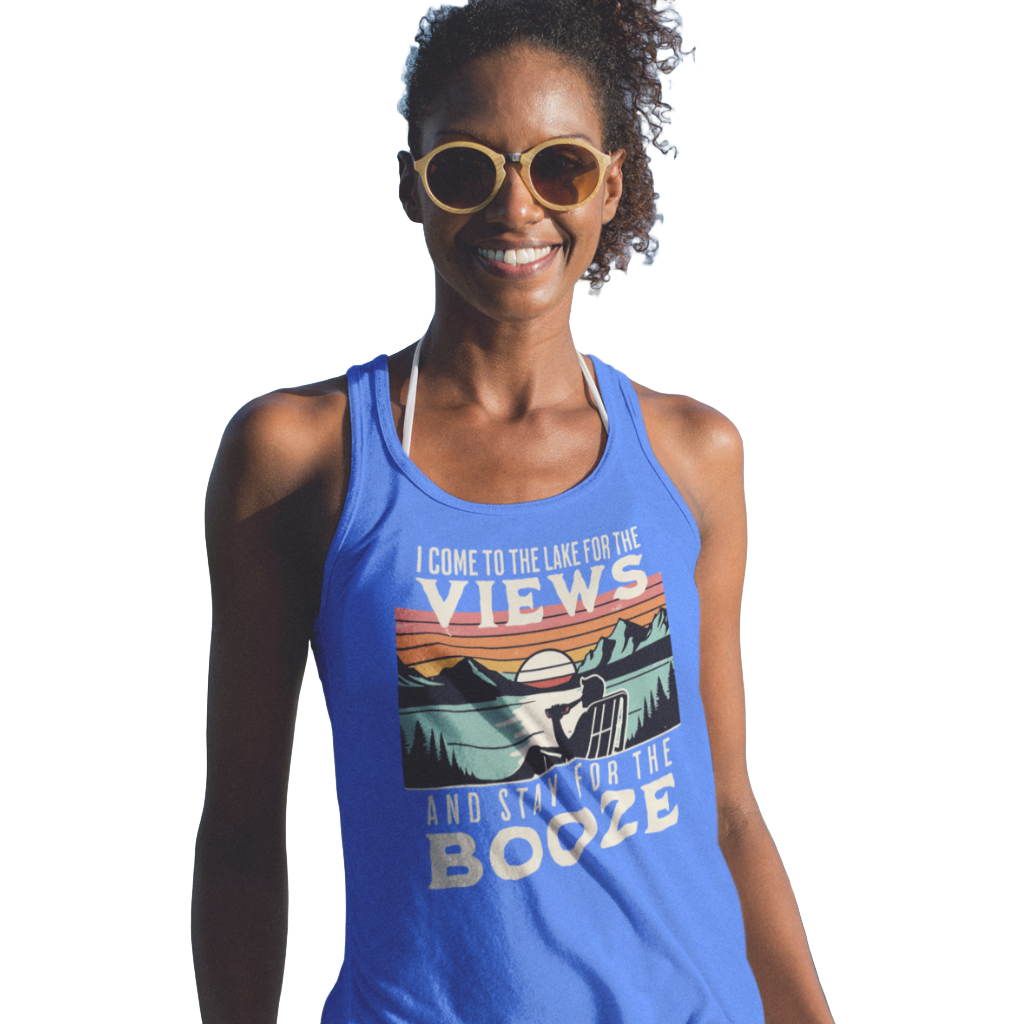 Racerback tank with "I Come to the Lake for the Views and Stay for the Booze," featuring a man in a beach chair, lake, and sunset.