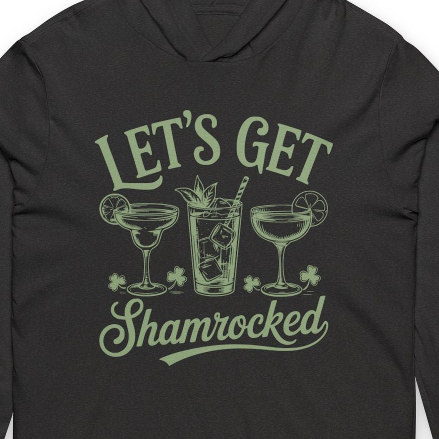 Black hoodie with green text 'Let's Get Shamrocked' and cocktail graphics on a white background
