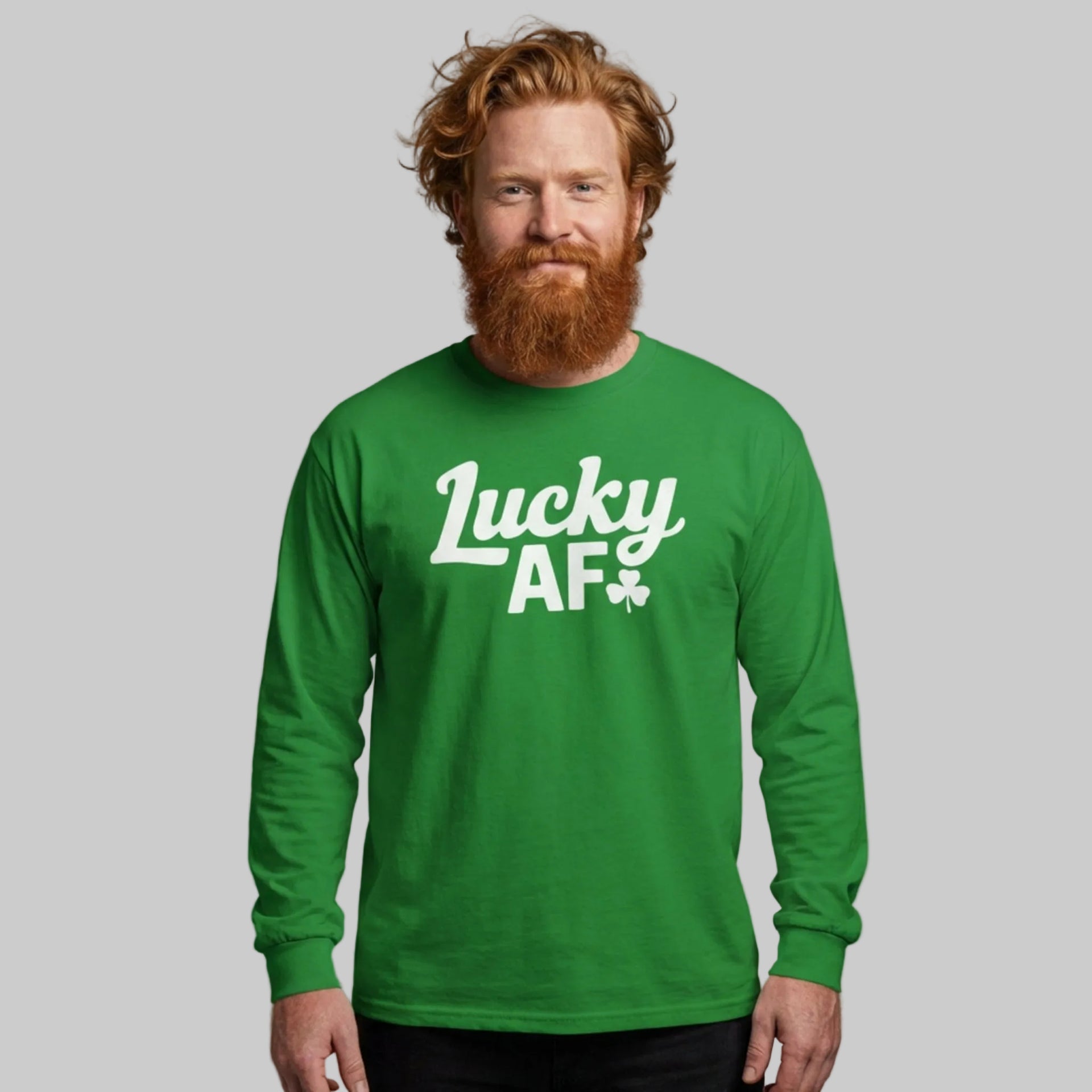 Man wearing a green long-sleeve shirt with the phrase 'Lucky AF' funny St Patricks Day design.