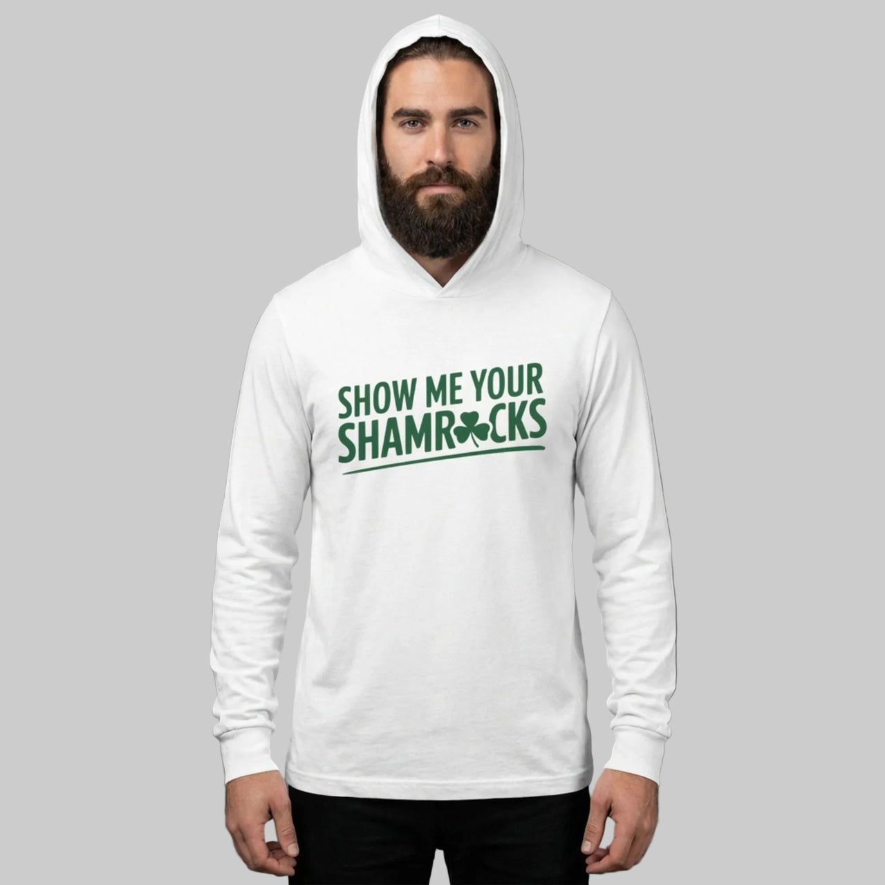 Man wearing a white hoodie with 'Show Me Your Shamrocks' text on a gray background