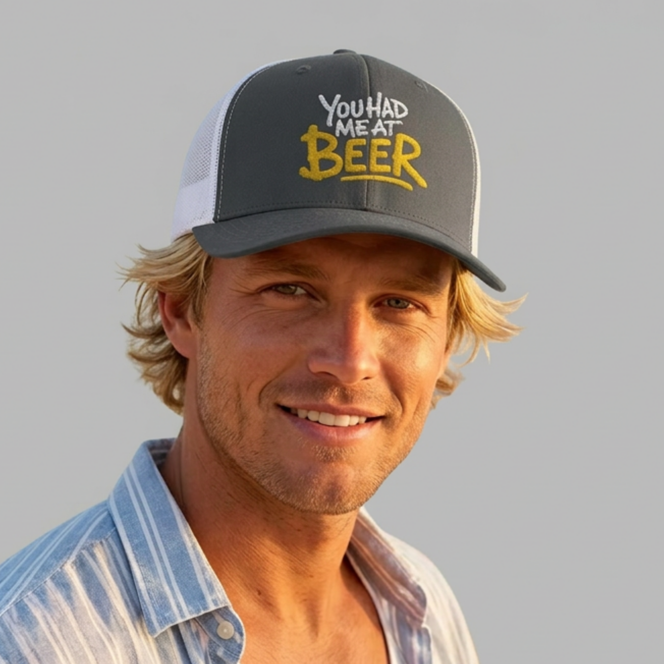 Man wearing a trucker hat with the phrase  'You Had Me at Beer' text funny spring break, guys trip, girls trip, bachelor party, bachelorette party, lake season, beach trip, summer vacation design