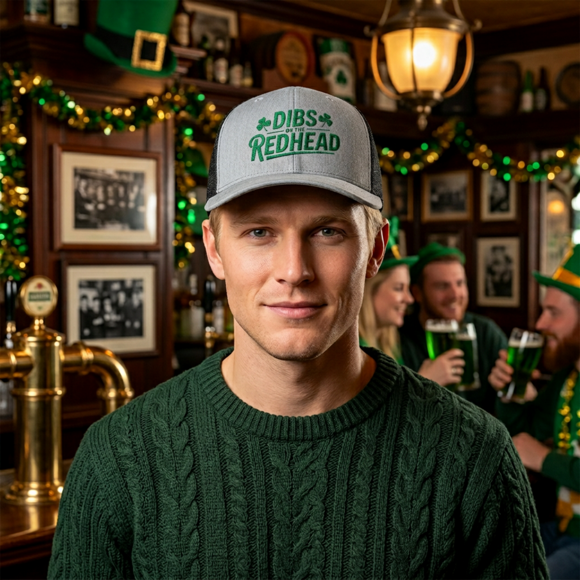 Man wearing a gray and black curved bill trucker hat with the text 'DIBS on the REDHEAD' funny st patricks day pub crawl design