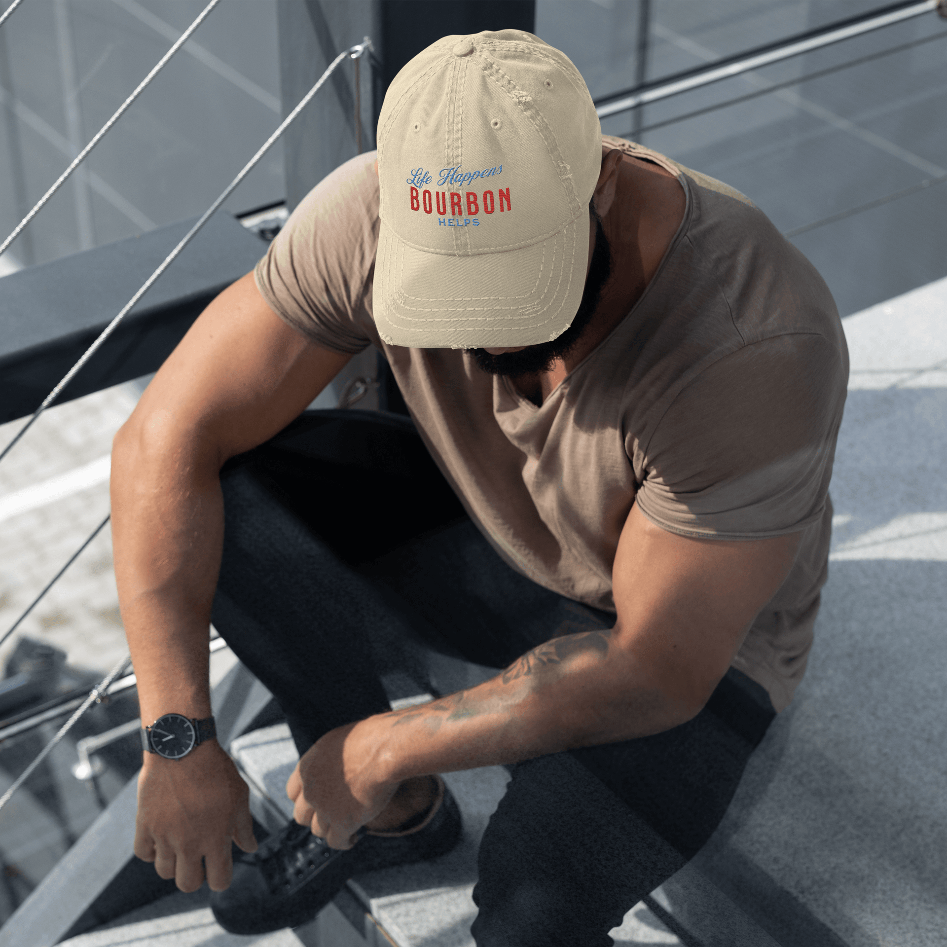 "Life Happens Bourbon Helps" Dad Hat | Fun & Edgy CapAdd flair with our "Life Happens Bourbon Helps" Dad Hat. Perfect for drinking enthusiasts. Distressed style, 100% cotton for comfort & style.