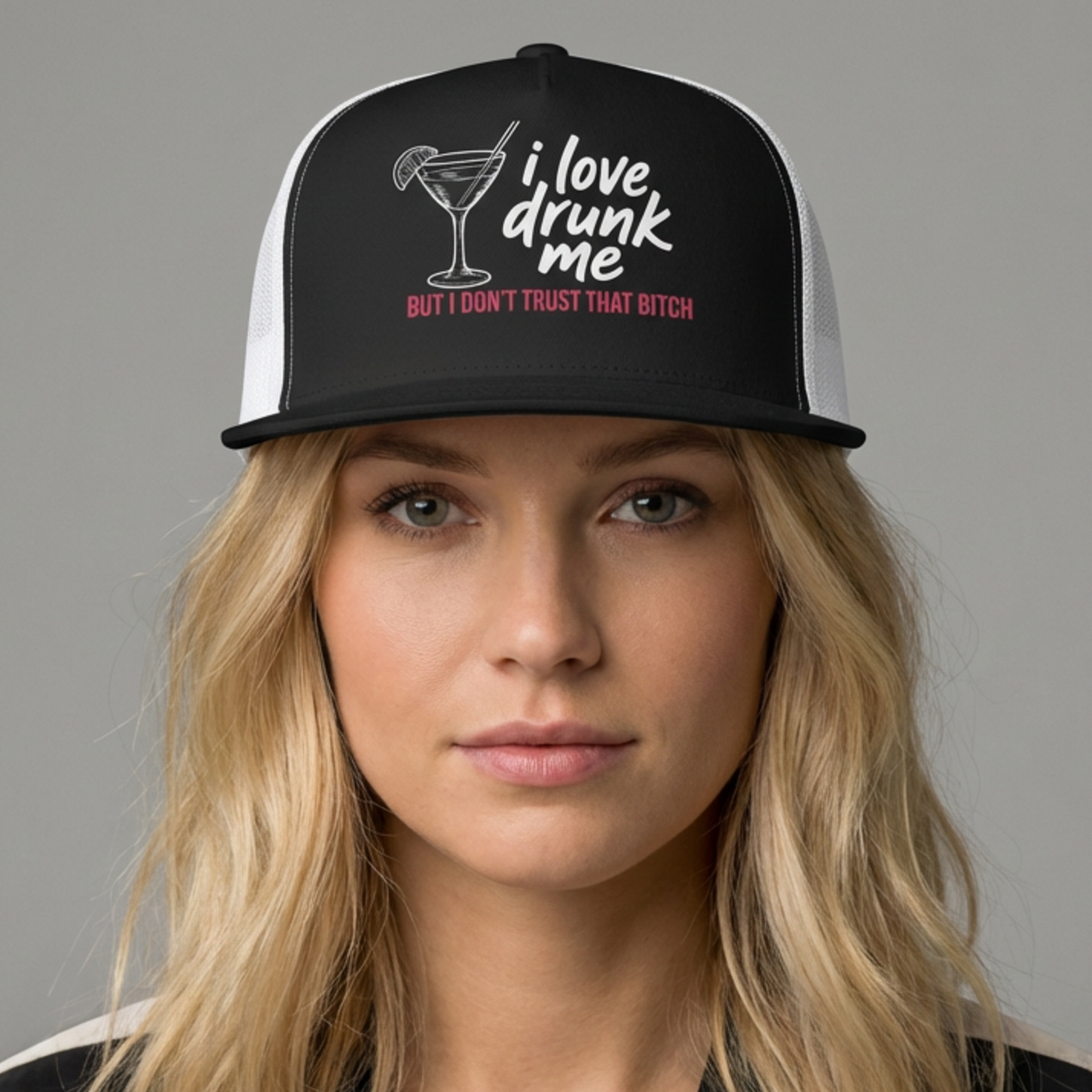 Woman wearing a black and white flat bill trucker hat with the phrase "I love drunk me, but I don't trust that bitch" funny spring break, girls trip, bachelorette party design