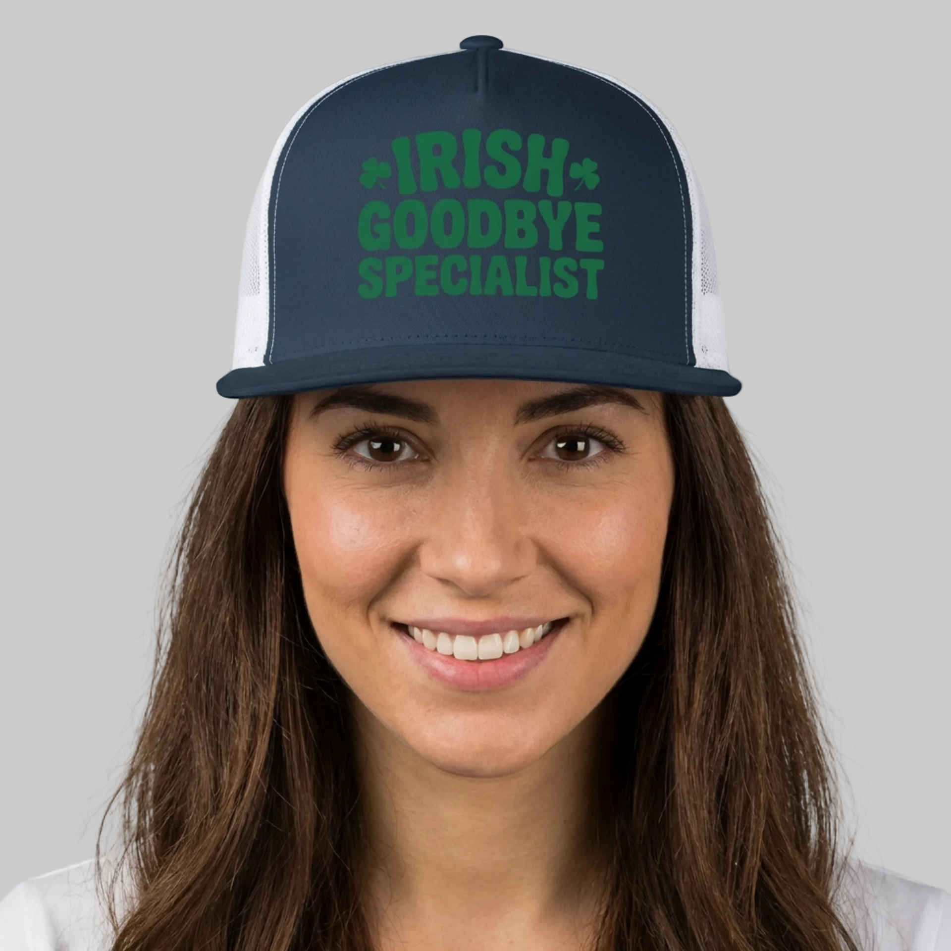 Person wearing a navy blue and white flat bill trucker hat  with the text "Irish Goodbye Specialist" funny St Patricks Day design