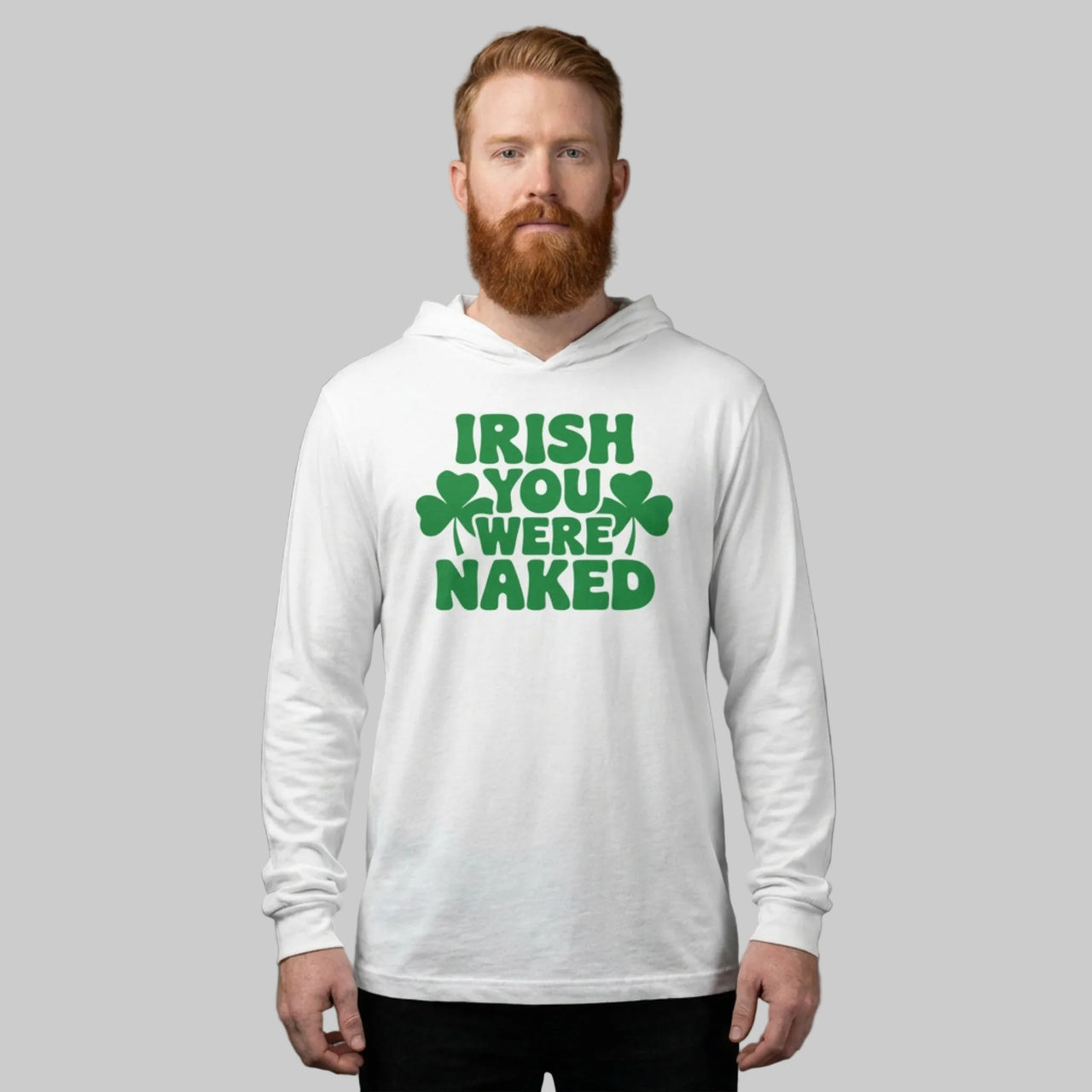 Man wearing a white hoodie with green text Irish You Were Naked and shamrock design on a gray background