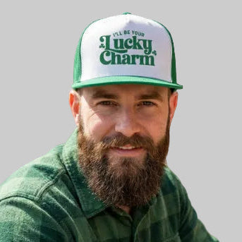 Kelly green and white St Patricks Day flat bill trucker hat with the Phrase “ill be your lucky charm” 