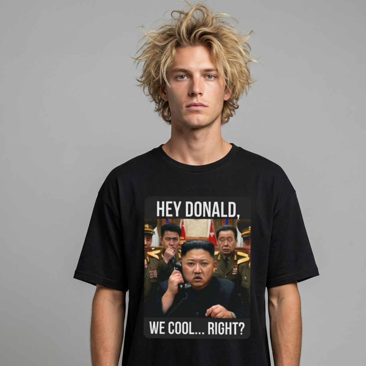 man wearing black tshirt with a meme of kim jong un on the phone with donald trump and the phrase "Hey Donald, We Cool... Right?" funny political statement shirt