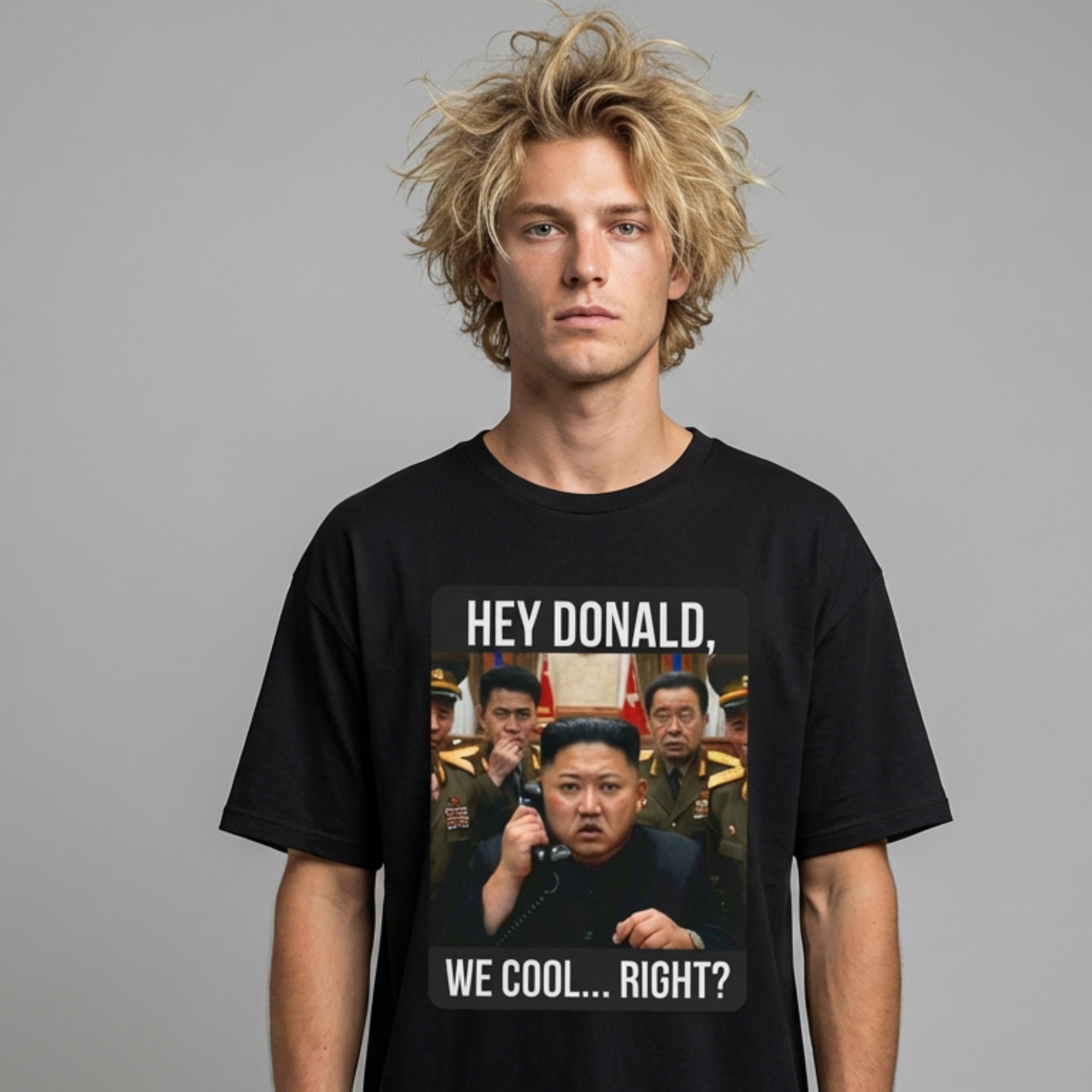 man wearing black tshirt with a meme of kim jong un on the phone with donald trump and the phrase "Hey Donald, We Cool... Right?" funny political statement shirt