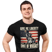 Give Me Liberty or Give Me Whiskey' text, Statue of Liberty holding a shot glass, and distressed American flag background