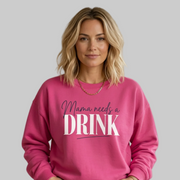 Woman wearing a pink sweatshirt with 'Mama needs a DRINK' text funny mother's day, mom life, girls trip design