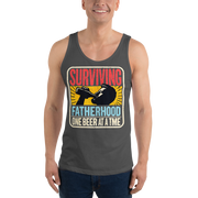 Celebrate fatherhood with our "Surviving Fatherhood One Beer at a Time" tank top. Perfect gift for dads who love a cold one. Ideal gift for Father's Day.