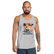 Man relaxing in a beach chair with a sunset backdrop, depicted on our 'Sorry, Out of Office' retro tank top.