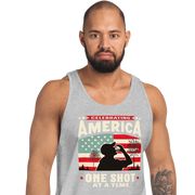 Tank top with Celebrating America One Shot at a Time text, silhouette of a man drinking a shot, and distressed American flag background. Perfect for 4th of July.