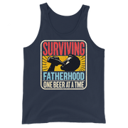 Celebrate fatherhood with our "Surviving Fatherhood One Beer at a Time" tank top. Perfect gift for dads who love a cold one. Ideal gift for Father's Day.