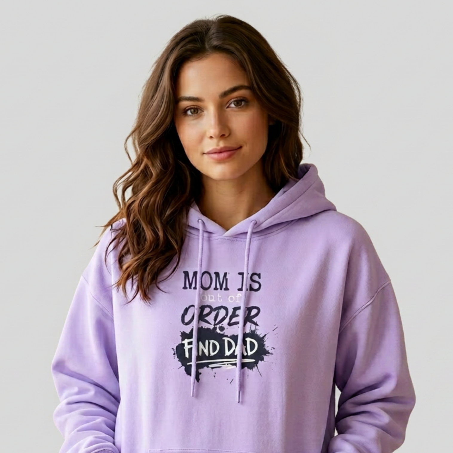 Woman wearing a lavender hoodie with text 'Mom is out of order find dad' funny mother's day, mom life, girls trip design