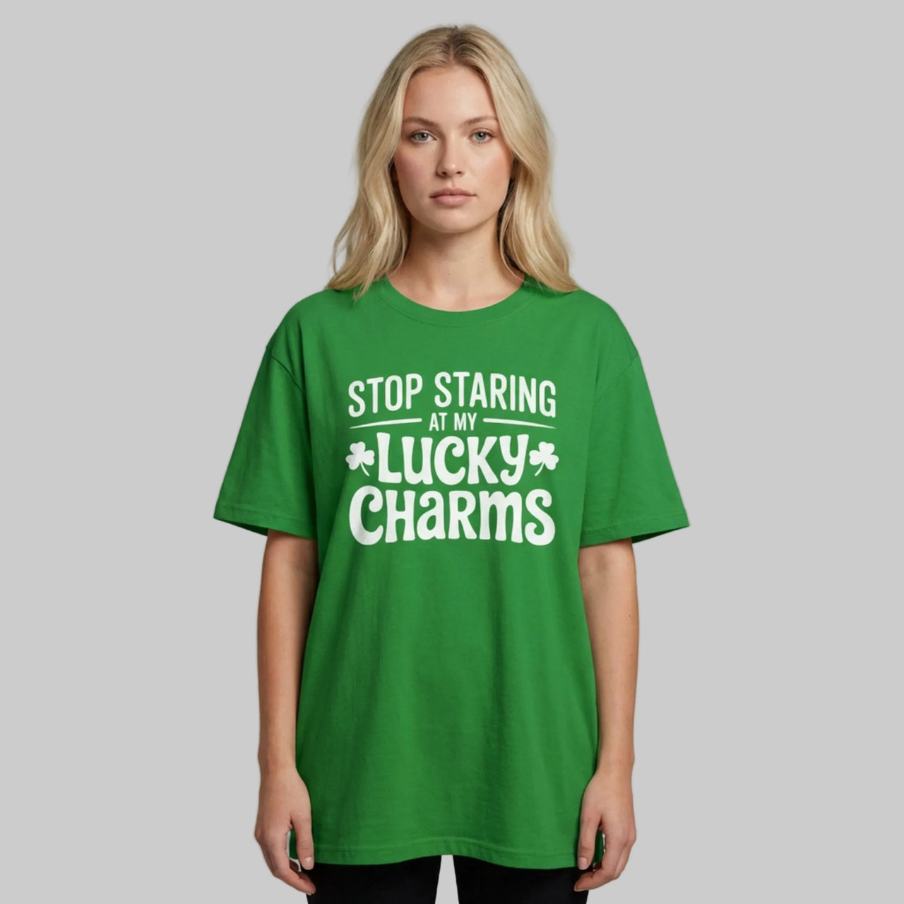 woman wearing a green t-shirt with the phrase "Stop Staring at my Lucky Charms" funny St Patricks Day design