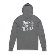 gray featherweight hoodie with the phrase "Taken By Tequila" with a sketched valentine's hearts and a shot glass with a lime surrounding the phrase to complete the design
