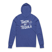 royal blue featherweight hoodie with the phrase "Taken By Tequila" with a sketched valentine's hearts and a shot glass with a lime surrounding the phrase to complete the design
