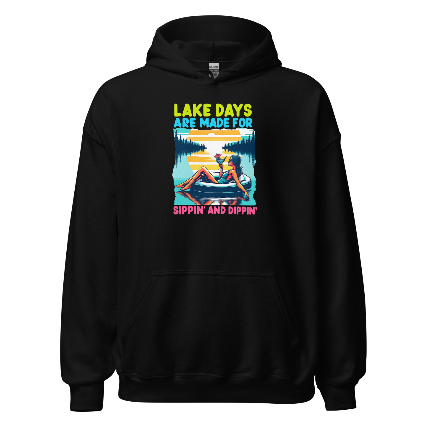 Hoodie with "Lake Days Are Made for Sipping and Dipping," showing a woman on a tube float with a cocktail, lake and sunset scene.