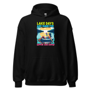 Hoodie with "Lake Days Are Made for Sipping and Dipping," showing a woman on a tube float with a cocktail, lake and sunset scene.