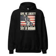 Hoodie with Give Me Liberty or Give Me a Shot of Bourbon text, Statue of Liberty holding a shot glass, and distressed American flag background. Perfect for 4th of July.