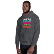 Hoodie with the phrase "Life's a Beach but I Prefer It with a Lakeside View and a Cocktail" in vibrant colors.