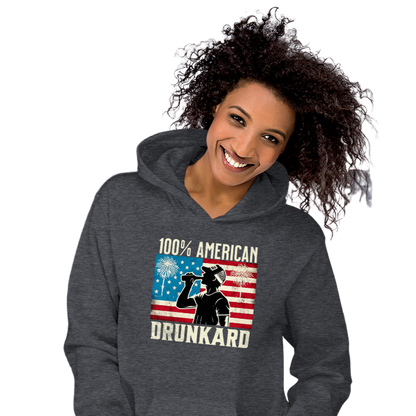 4th of July Hoodie with '100% American Drunkard' text, man drinking a bottle of beer wearing a trucker hat, and distressed American flag background