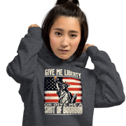 Hoodie with Give Me Liberty or Give Me a Shot of Bourbon text, Statue of Liberty holding a shot glass, and distressed American flag background. Perfect for 4th of July.