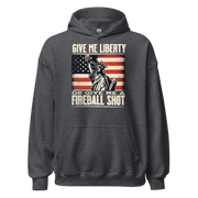 Hoodie with 'Give Me Liberty or Give Me a Fireball Shot' text, Statue of Liberty holding a shot glass, and distressed American flag background. Perfect for 4th of July.