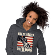 Hoodie with Give Me Liberty or Give Me a Shot of Tequila text, Statue of Liberty holding a shot glass, and distressed American flag background. Perfect for 4th of July.