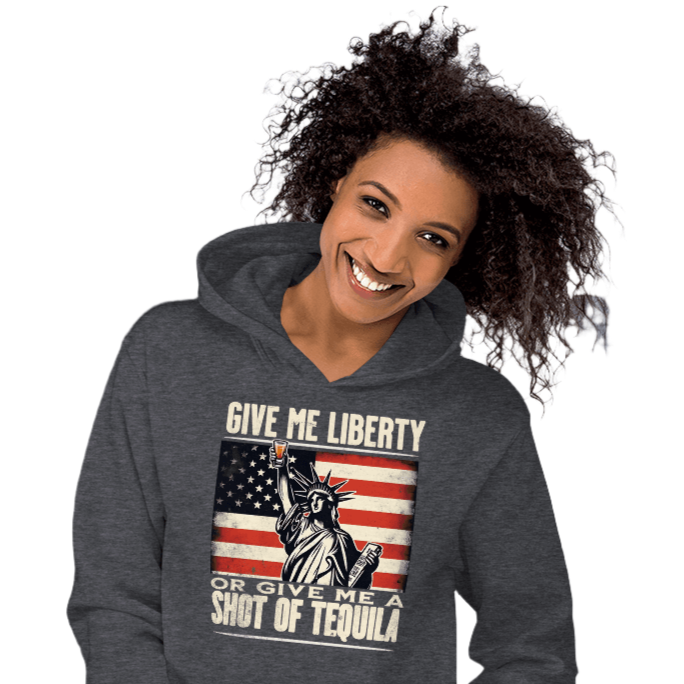 Hoodie with Give Me Liberty or Give Me a Shot of Tequila text, Statue of Liberty holding a shot glass, and distressed American flag background. Perfect for 4th of July.