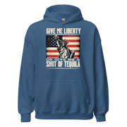 Hoodie with Give Me Liberty or Give Me a Shot of Tequila text, Statue of Liberty holding a shot glass, and distressed American flag background. Perfect for 4th of July.