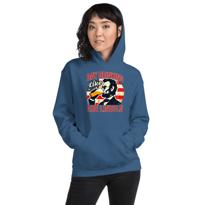 Hoodie with Day Drinking Like Abe Lincoln text, image of Abe Lincoln drinking a glass of beer, and distressed American flag background. Perfect for 4th of July