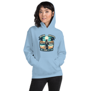 Woman enjoying a cocktail on the beach depicted on 'Sun, Sand, and a Drink in My Hand' hoodie.