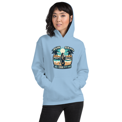 Woman enjoying a cocktail on the beach depicted on 'Sun, Sand, and a Drink in My Hand' hoodie.