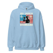 4th of July Hoodie with '100% American Drunkard' text, man drinking a bottle of beer wearing a trucker hat, and distressed American flag background