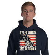 Hoodie with Give Me Liberty or Give Me a Shot of Tequila text, Statue of Liberty holding a shot glass, and distressed American flag background. Perfect for 4th of July.