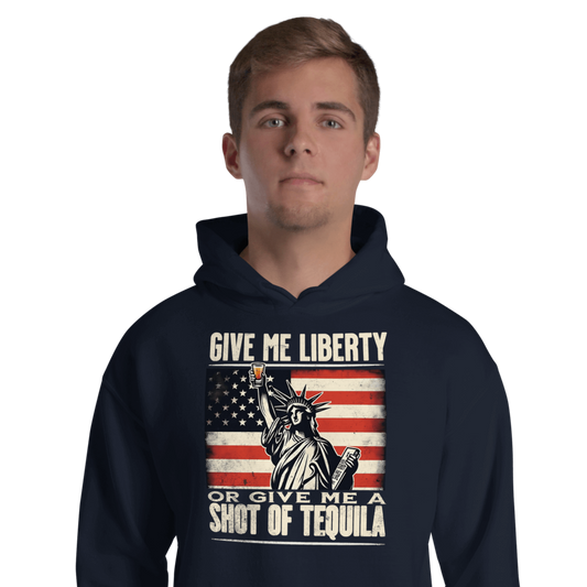 Hoodie with Give Me Liberty or Give Me a Shot of Tequila text, Statue of Liberty holding a shot glass, and distressed American flag background. Perfect for 4th of July.